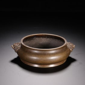 A copper-tired lion head and ear incense burner of the Ming Dynasty