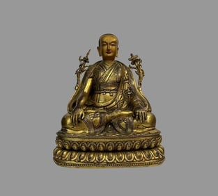 A fine bronze gilt guru