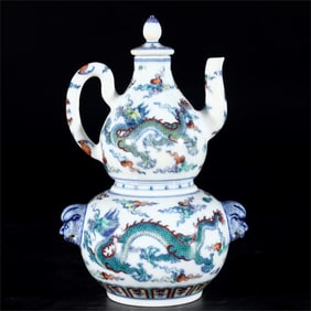 A blue and white dragon pattern warm wine pot made in the Yongzheng year of the Qing Dynasty