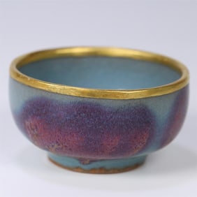 A small tea bowl with silver gilt gold rim from the Jun kiln of the Song Dynasty