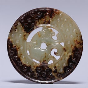 A piece of Hetian jade with a drum nail in the Ming Dynasty hollow dragon pattern jade