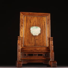 A Qing Dynasty Huanghuali inlaid jade insert