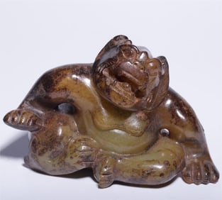 An ancient jade bear handle piece of the Ming Dynasty