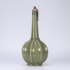 A Song Dynasty Yue kiln silver mouth eight-sided long-necked bottle