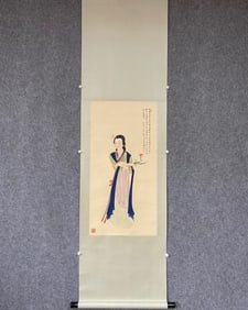 A vertical scroll of Zhang Daqian's Gongbi lady on paper