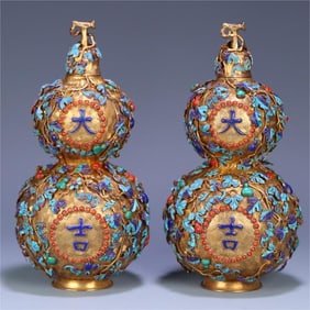 A pair of silver-gilt emerald gemstone Daji Da Li Duozi Duo Fu vase of the Qing Dynasty
