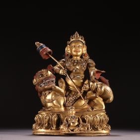A bronze gilt statue of the God of Wealth in the Qing Dynasty