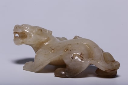 A piece of Hetian white jade from the Qing Dynasty with a Qintian Lu auspicious beast handle