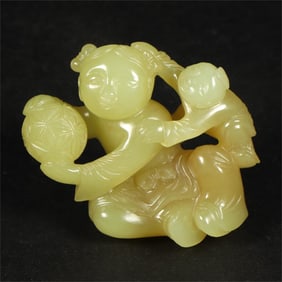 A beautiful Hetian topaz boy ball carving