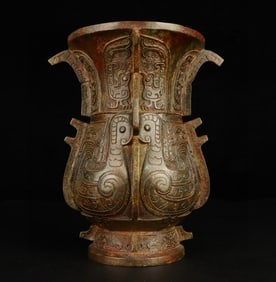 A bronze phoenix and bird pattern round statue of the Western Zhou Dynasty