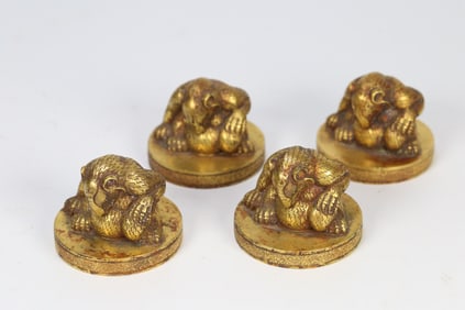 A set of copper gilt bear buttons of the Han Dynasty Mei Lan Zhu Ju town seat