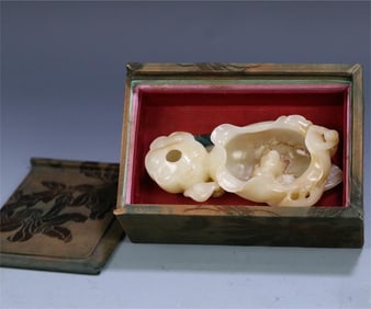 A piece of Hetian jade boy lotus leaf wash in the Qing Dynasty