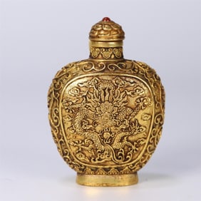 A fine copper gilt dragon pattern snuff bottle