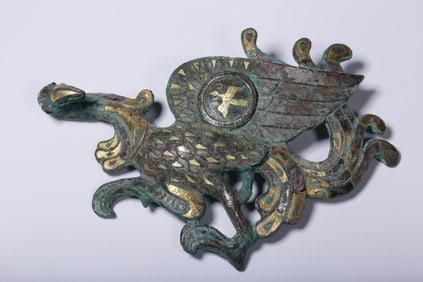 A bronze gold and silver phoenix bird with a hook from the Ming Dynasty