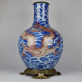 A beautiful blue and white glazed red copper-rimmed celestial globe vase