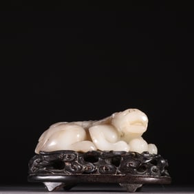 A Qing Dynasty Hetian jade beast ornament