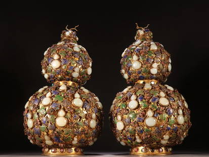 A Qing Dynasty copper gilt inlaid Hetian jade tourmaline "many children and many blessings" gourd: The copper gilt inlaid Hetian jade tourmaline "many children and many blessings" gourd bottle in the Qing Dynasty Size: H:37cm W:20cm (The Dimensions Of All Batches Are Manually Measured.If You Need M