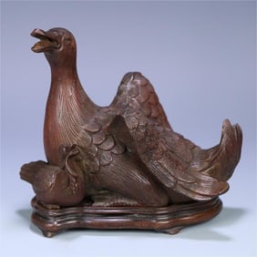 A beautiful old agarwood duck smoker