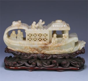 A Hetian jade figure boat-shaped ornament of the Qing Dynasty
