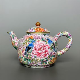 A gold-painted pot of enamel colors of kaleidoscope flowers and birds made in the Qianlong period of