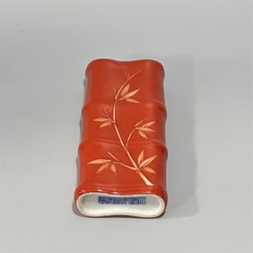 A pastel coral red carved bamboo pattern bamboo pillow paper made in the Qianlong period of the Qing