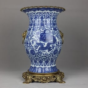 A beautiful blue and white entwined dragon pattern inlaid with a bronze lion ring amphora
