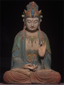 A beautiful old wooden carved statue of the Bodhisattva