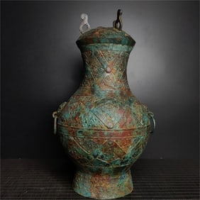 A bronze cloud clam round vase from the Warring States period