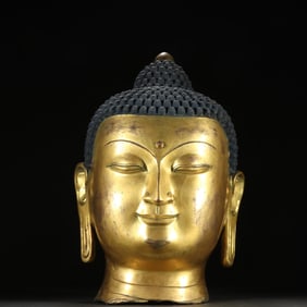 A copper gilt Buddha head of the Qing Dynasty