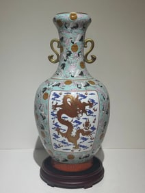 An official kiln hundred cranes and dragon phoenix amphora made in the Yongzheng era of the Qing