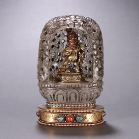 A bronze gilt crystal Buddha niche black statue of the Qing Dynasty