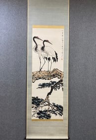A vertical axis of Xu Beihong's pine crane drawing on paper