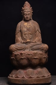 A beautiful old wooden carved statue of the Bodhisattva