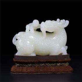A Qing Dynasty Hetian jade unicorn ornament