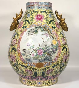 A Qing Dynasty enamel color king glaze entwined lotus flower window flower bird deer head statue
