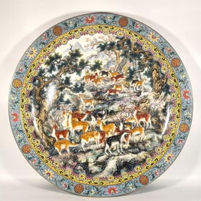 A Qing Dynasty enamel color hundred deer plate