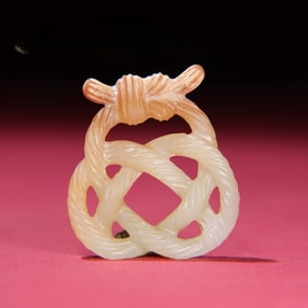 A Han Dynasty Shengkeng white jade rope pattern pendant
