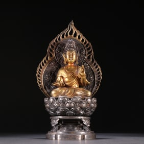 A sterling silver gilt Guanyin ornament from the Qing Dynasty