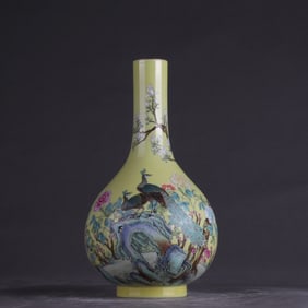 A long-necked bottle of yellow pastel flowers and birds inscribed with poems made in the Qianlong