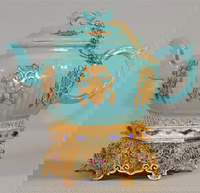 A Qing Dynasty copper gilt filigree foot inlaid turquoise glazed six-sided pot and single-hole pot
