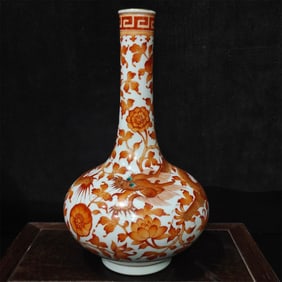 A red gold-painted dragon made in the Qianlong period of the Qing Dynasty wears a peony appreciation