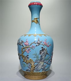 An enamel carved turquoise green space magpie plum garlic head bottle made in the Qianlong period of