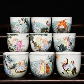 A set of pastel eighteen Arhat pattern cups made in the Qianlong period of the Qing Dynasty