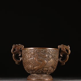 A copper tyre phoenix pattern cup of the Qing Dynasty