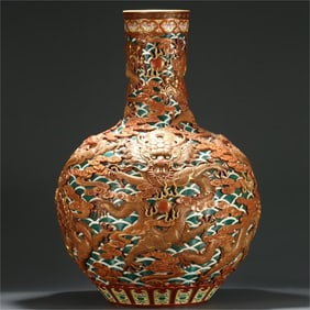 A relief pastel golden dragon playing pearl ball vase in the Qing Dynasty
