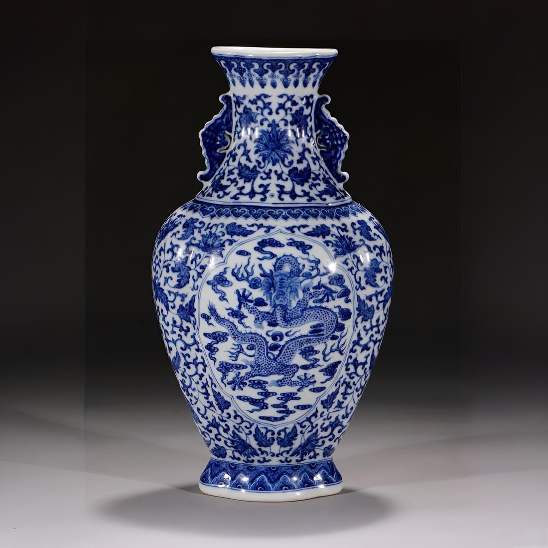 A blue and white entwined lotus made in the Qianlong period of the Qing Dynasty is upright dragon: The blue and white entwined lotus made in the Qianlong era of the Qing Dynasty is upright dragon pattern amphora Size:H:36.2cm (The Dimensions Of All Batches Are Manually Measured.If You Need More Det