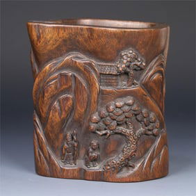 A pen holder of the Qing Dynasty's agarwood character story