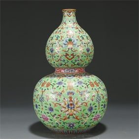 A turquoise green flower gourd bottle