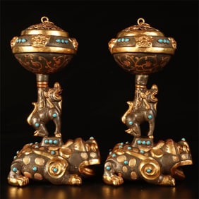 A pair of copper tires of the Qing Dynasty are partially made of gold and silver dragon turtle