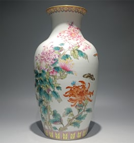 An enamel butterfly love chrysanthemum Guanyin vase made in the Qianlong era of the Qing Dynasty